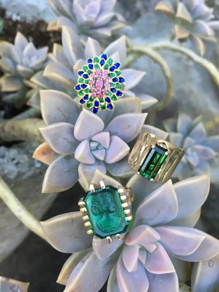 heirloom colorful gemstone rings styled on succulent plants