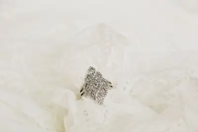 marquise shaped filigree diamond ring on lace material