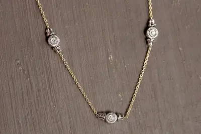 3 diamond on a necklace