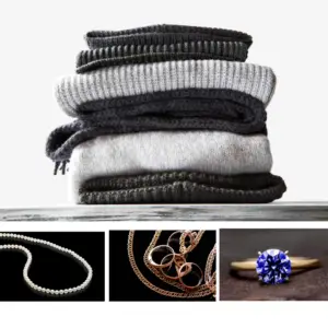 a stack of black and gray sweaters with pearls, gold chains, and gemstones under it showing the best jewelry combinations in winter