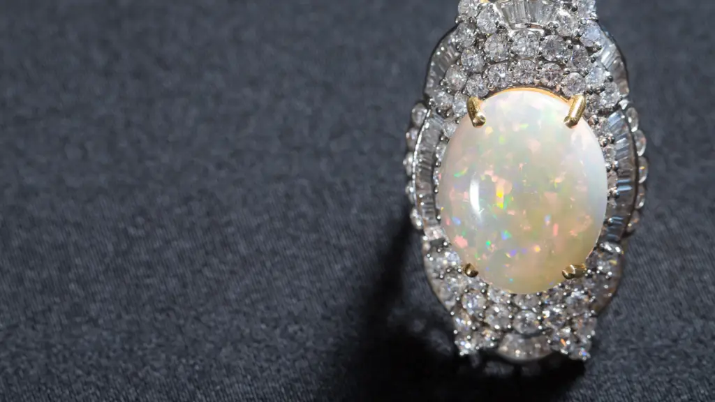 A ring featuring opals and diamonds showing snowy white gemstone styles