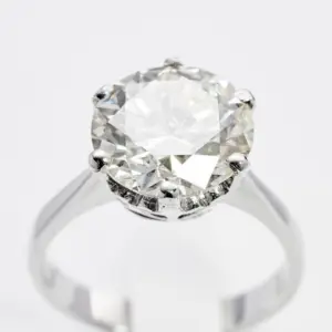 A snowy white gemstone ring of white topaz in a white gold setting