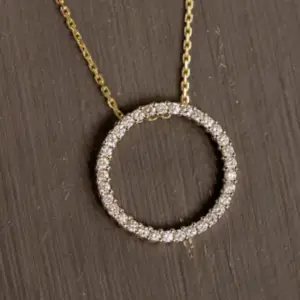 A diamond eternity pendant necklace